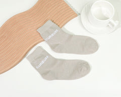 Chaussettes mi hautes à message - Curieuse