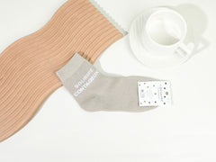 Chaussettes mi hautes à message - Sourire contagieux